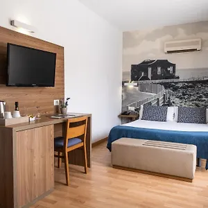 Отель Adonis Plaza